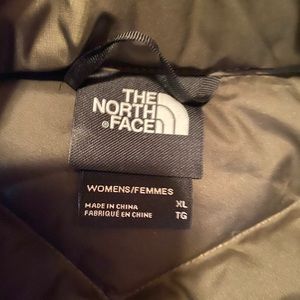 NWOT dark olive green North Face Vest. Unworn.